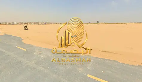 أرض تجارية بموقع مميز للبيع في روضة القرط، ضاحية الرويضات، الشارقة