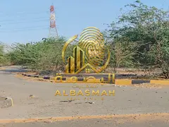 Corner industrial plot for sale in the Eastern Arqub Industrial Area.