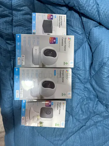 Lot of 4 EZVIZ Smart Home Cameras (2x indoor dome, 1x cube, 1x battery unit) - good condition