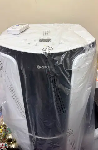 (Like New ) Gree 1Ton Portable Air Conditioner (No offers please)