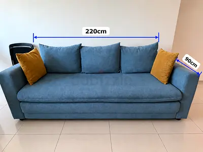 3-seater blue fabric sofa bed, 220cm length, good condition