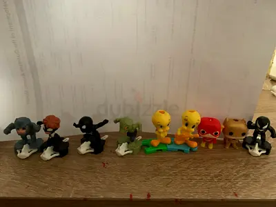 Lot of 9 Small Collectible Cartoon/Funko-style Figures