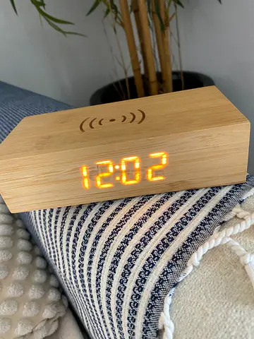 Wireless phone charger/ alarm clock