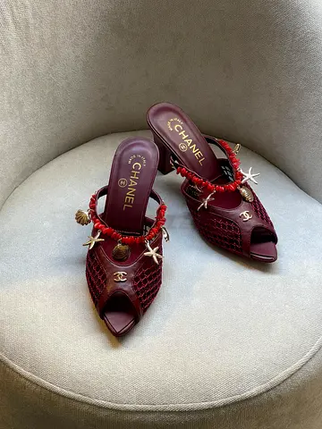 Chanel burgundy woven leather mules with seashell charms, size unknown