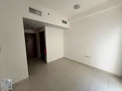 Studio apartment for annual rent in Al Rashidiya 2, Ajman, Horizon Towers, overlooking the creek wit