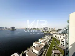 2BR with Laundry Room | Prime Waterfront Living