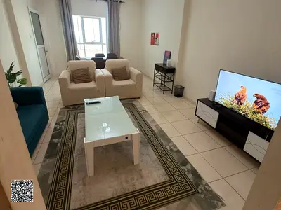 One-bedroom apartment with a living room for sale on an installment plan in Al Rashidiya 1, Ajman.