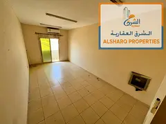 Master bedroom, 2 bathrooms, balcony, split A/C; located behind Al Hamidiya Police Station; easy acc