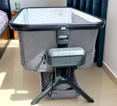 Portable bedside bassinet / cradle , electronic swing with music