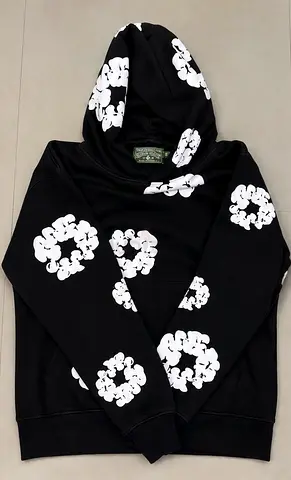 Black hoodie with white floral print - good condition.