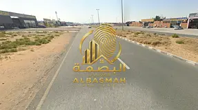 Enclosed yard for sale in Block 4, Emirates Industrial City.