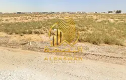 Commercial-industrial land for sale in Al Qasimia 2.