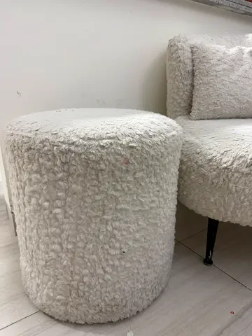 Pair of white fluffy ottomans / poufs - cozy textured fabric