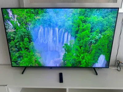 Samsung 55-inch Q60A QLED 4K Smart TV + solar remote and safety straps. Model: QA55Q60AAUXZ