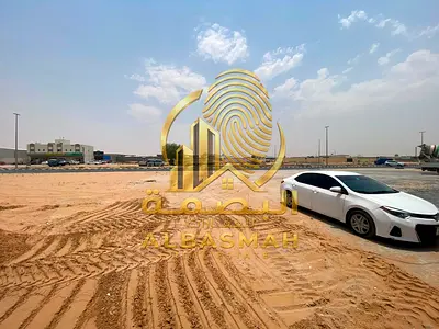 حوطة للإيجار في الصجعة الصناعية | 20,000 قدم² | شارع رئيسي | واجهة رخام | كهرباء 90 KVA