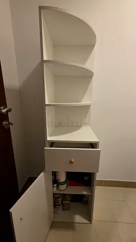 Tall white corner cabinet with shelves and drawer - good condition