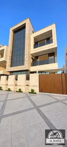 🏡 Luxury villa for sale in Al Yasmeen, Ajman—distinctive property with a direct view of Al Humaidiya Park 🌳✨ (3 floors + roof terrace) featuring 5 m