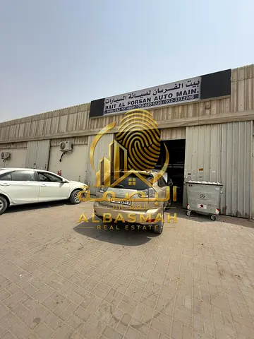 6 warehouses, 2 shops, and 20 worker accommodation rooms for sale in Al Sajaa Industrial area, Sharjah, with an area of 20,000 square feet