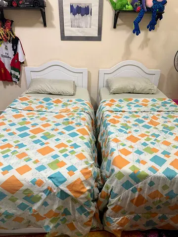 Single white wooden bed frame with headboard - good condition 300 both