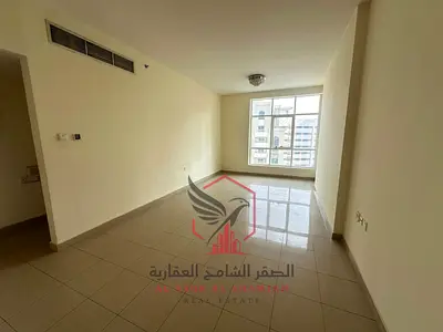 Beautiful 2BR + Hall in Al Taawun with 2 Parking Spaces & 1 Month Free. Prime location near all services & Dubai exit.