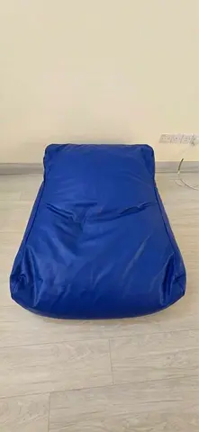 Blue leather-look bean bag lounger - single seat