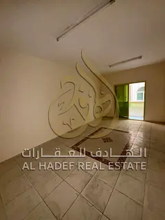 1 Bedroom + Living Room for Annual Rent in Al Qasimia with Balcony, Landlord-Covered Maintenance, CC