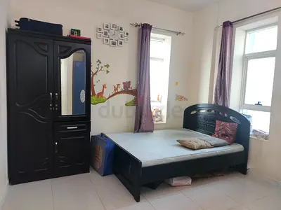 Solid dark wood single bed with mattress and matching wardrobe - good condition