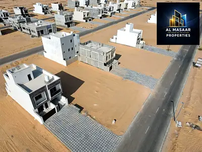 للبيع أرضي سكنية بموقع متميز في منطقة الزاهيه في عجمان شامل رسوم التسجيل ارتداد 25 متر
