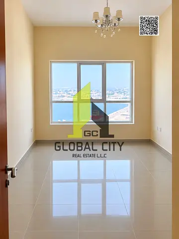 Sea view 2 bedroom hall for sale full open view with parking in ajman pearl tower