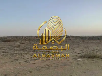 Commercial land for sale in Sharjah, Al Malha, Juwaiza, prime location. Ownership by UAE and GCC nationals only.