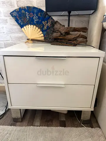 Chest of drawers and a pair of bedside tables