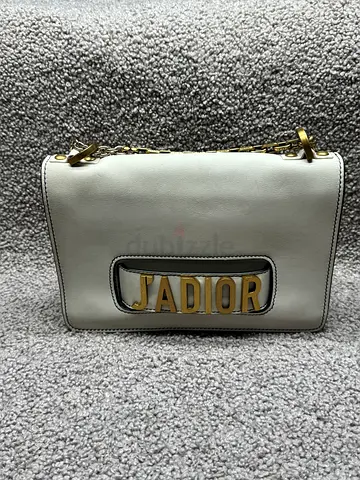 White J'Adior leather clutch with gold chain