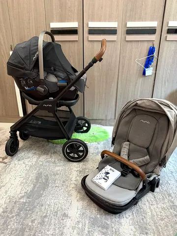 Nuna triv  travel system with infant car seat, stroller