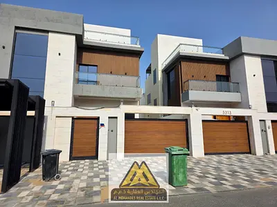 Luxury villa for annual rent in Al Yasmeen, Ajman | Ground floor, first floor, and roof | 5 master bedrooms | Majlis and living room | Maid's room | G