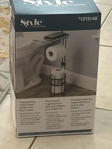 Toilet tissue holder with phone holder
