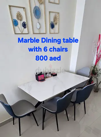 Marble dining table with 6 chairs - good condition, 800 AED