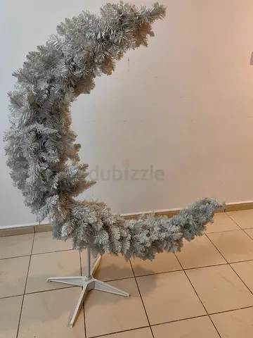 White crescent-shaped artificial Christmas tree on stand — good condition