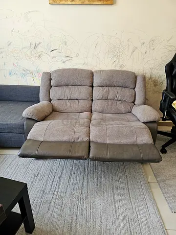 Two-seater reclining sofa in grey microfiber and leather — good condition
