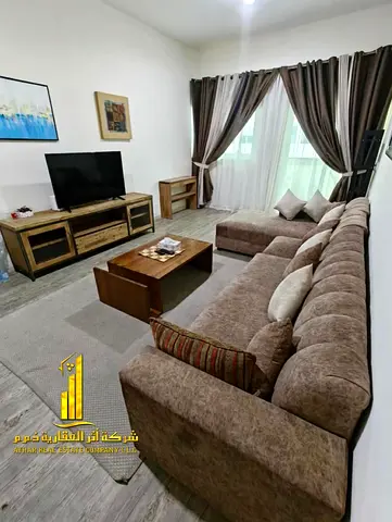 Luxury apartment, second occupancy, one bedroom, living room with open balcony. Ajman One Tower. Fu