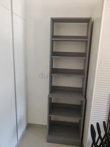 Tall grey shelving unit - 6 open shelves, good condition