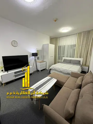 Luxury studio apartment, first occupancy, with a separate kitchen and open view. Fully furnished. ✨ Ajman, Orient Tower. For monthly rent.