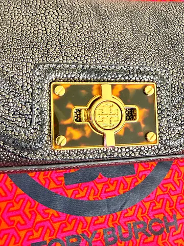 Tory Burch black textured shoulder bag with tortoiseshell turn-lock