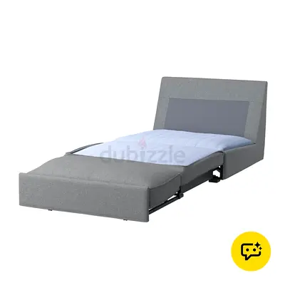 Single grey fabric sofa bed with pull-out trundle, from Ikea