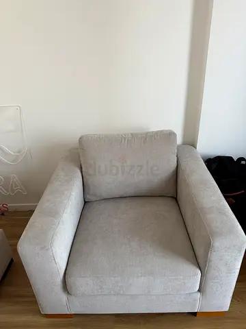Light grey two-seater sofa / loveseat in prestine condition