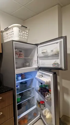 Used double-door refrigerator, good working condition