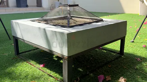 Square Outdoor Fire Pit on Metal Stand - great for cozy outdoor winters and bbq.