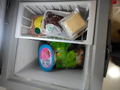 Small chest freezer (used) with food inside - good working condition