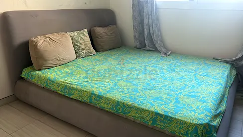 Queen upholstered bed frame with mattress - good condition