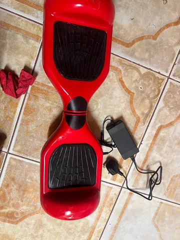 Red two-wheel self-balancing hoverboard (used)