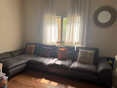 Large L-shaped leather sofa, dark brown, good condition